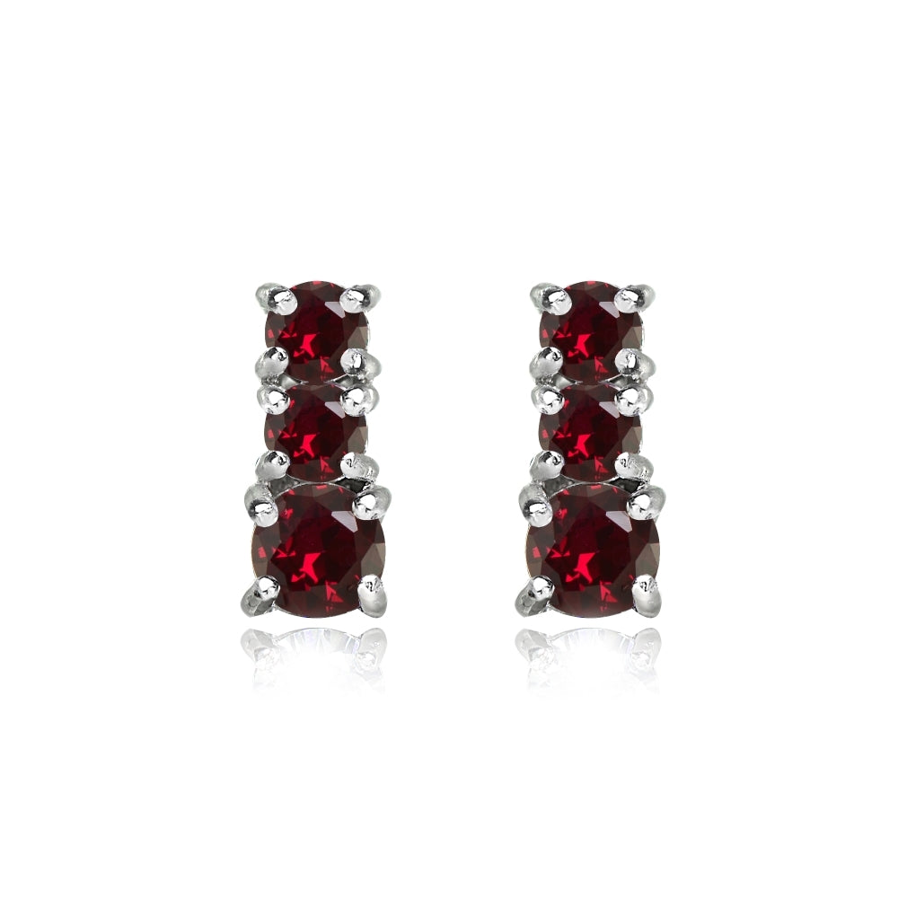 Sterling Silver Created Ruby Round Graduating Three Stone Stud Earrings