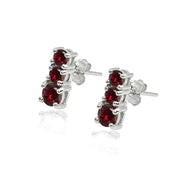 Sterling Silver Created Ruby Round Graduating Three Stone Stud Earrings