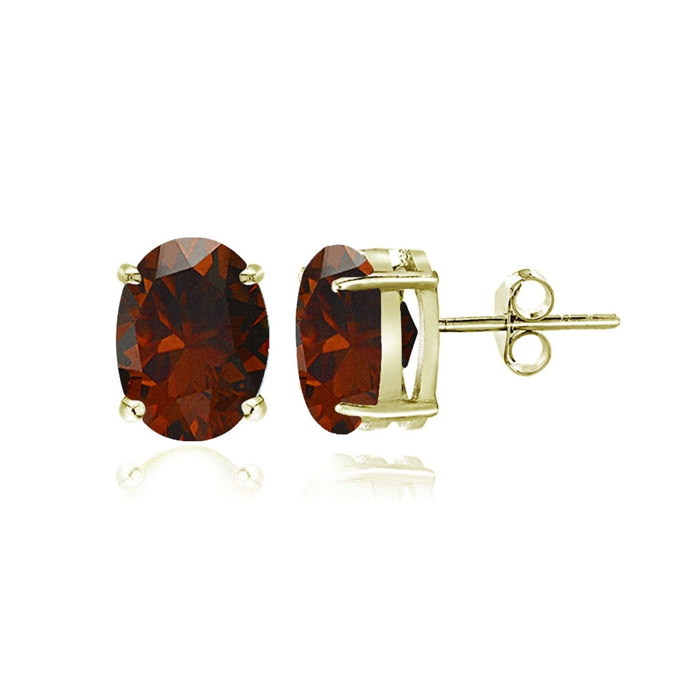 Gold Tone over Sterling Silver Garnet 5x3mm Oval Stud Earrings