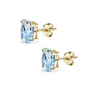 Yellow Gold Flashed Sterling Silver Blue Topaz 7x5mm Oval-Cut Solitaire Stud Earrings