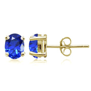 Yellow Gold Flashed Sterling Silver Created Blue Sapphire 7x5mm Oval Stud Earrings