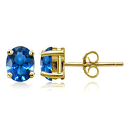 Yellow Gold Flashed Sterling Silver Created London Blue Topaz 7x5mm Oval Stud Earrings