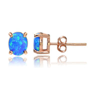Rose Gold Tone over Sterling Silver Created Blue Opal 6x4 Oval Stud Earrings