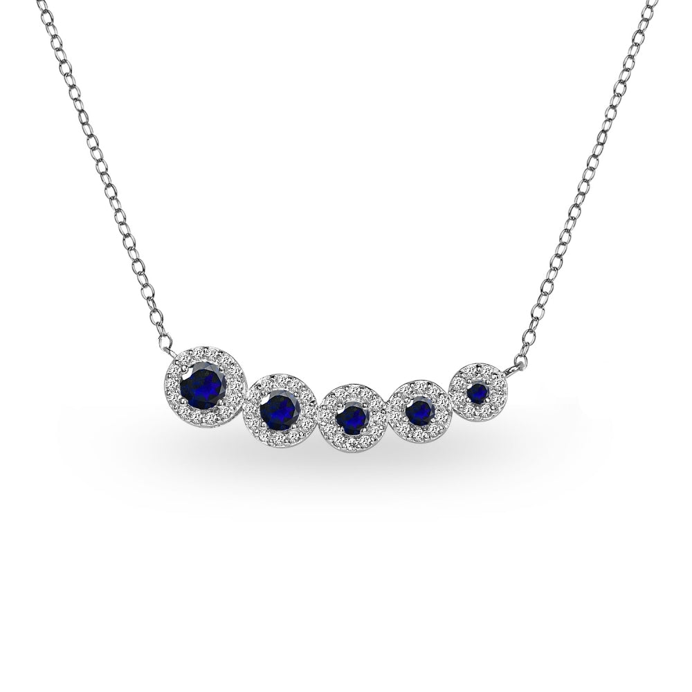 Sterling Silver Created Blue Sapphire Graduated Journey Necklace with White Topaz Accents