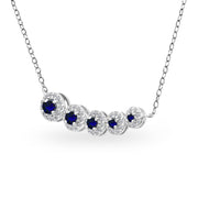 Sterling Silver Created Blue Sapphire Graduated Journey Necklace with White Topaz Accents