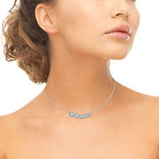 Sterling Silver Blue Topaz Graduated Journey Necklace with White Topaz Accents