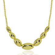 Yellow Gold Flashed Sterling Silver Polished Journey Graduated Oval Bead Dainty Chain Necklace, 16 Inch + Ext
