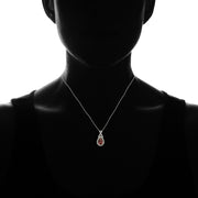 Sterling Silver Garnet and White Topaz X and Teardrop Necklace
