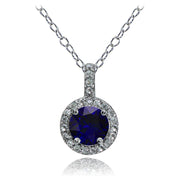 Sterling Silver Created Sapphire and White Topaz Halo Necklace
