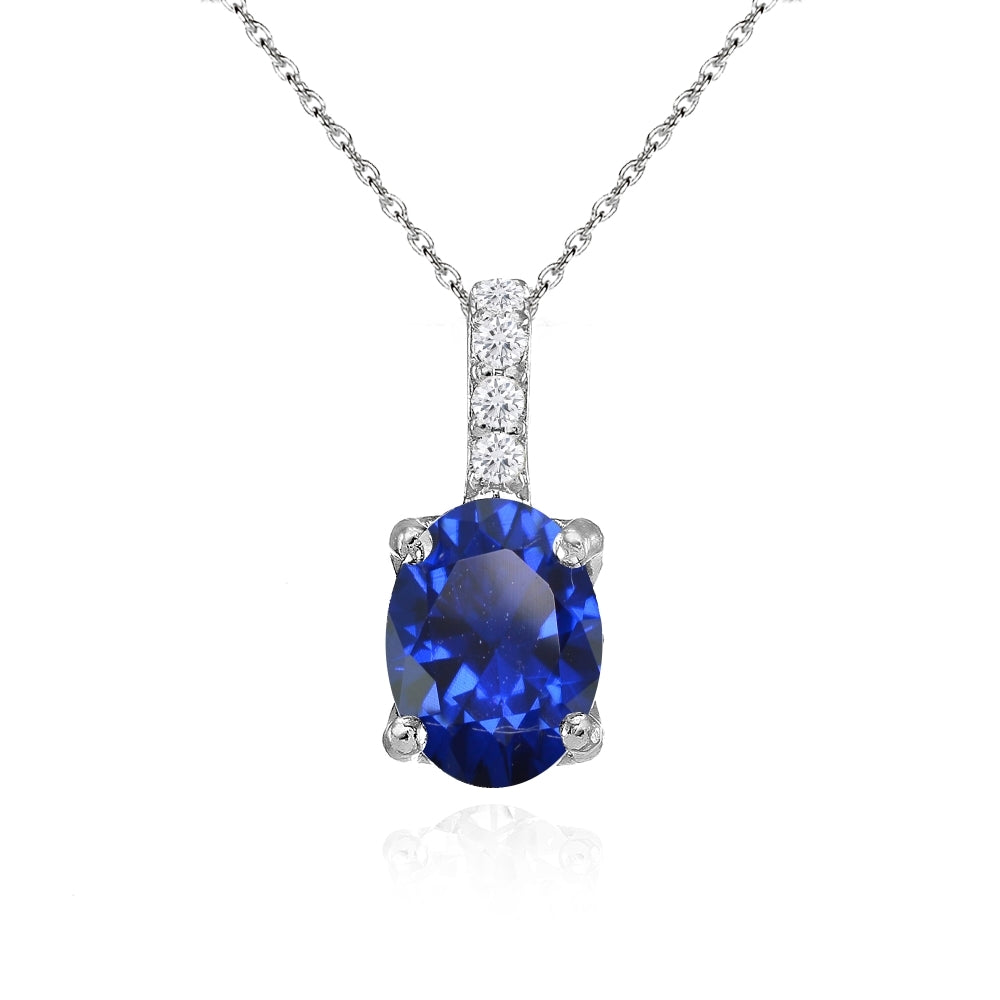 Sterling Silver Created Blue Sapphire and White Topaz Oval Crown Necklace