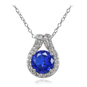 Sterling Silver Created Blue Sapphire Round Halo Necklace with CZ Accents