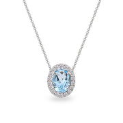 Sterling Silver Blue Topaz Oval Halo Slide Pendant Necklace with CZ Accents