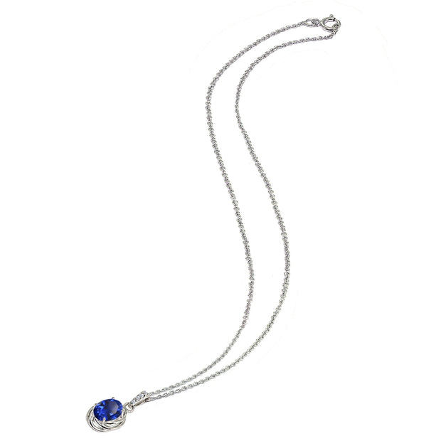 Sterling Silver Created Blue Sapphire & Cubic Zirconia 8x6mm Oval Love Knot Pendant Necklace