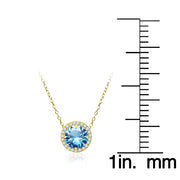 Yellow Gold Flashed Sterling Silver Created Blue Topaz and Cubic Zirconia Round Halo Necklace