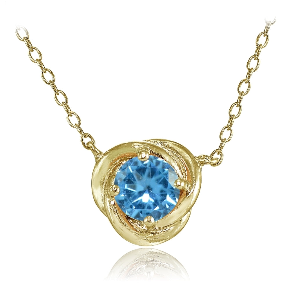 Yellow Gold Flashed Sterling Silver Created Blue Topaz 6mm Round Love Knot Pendant Necklace