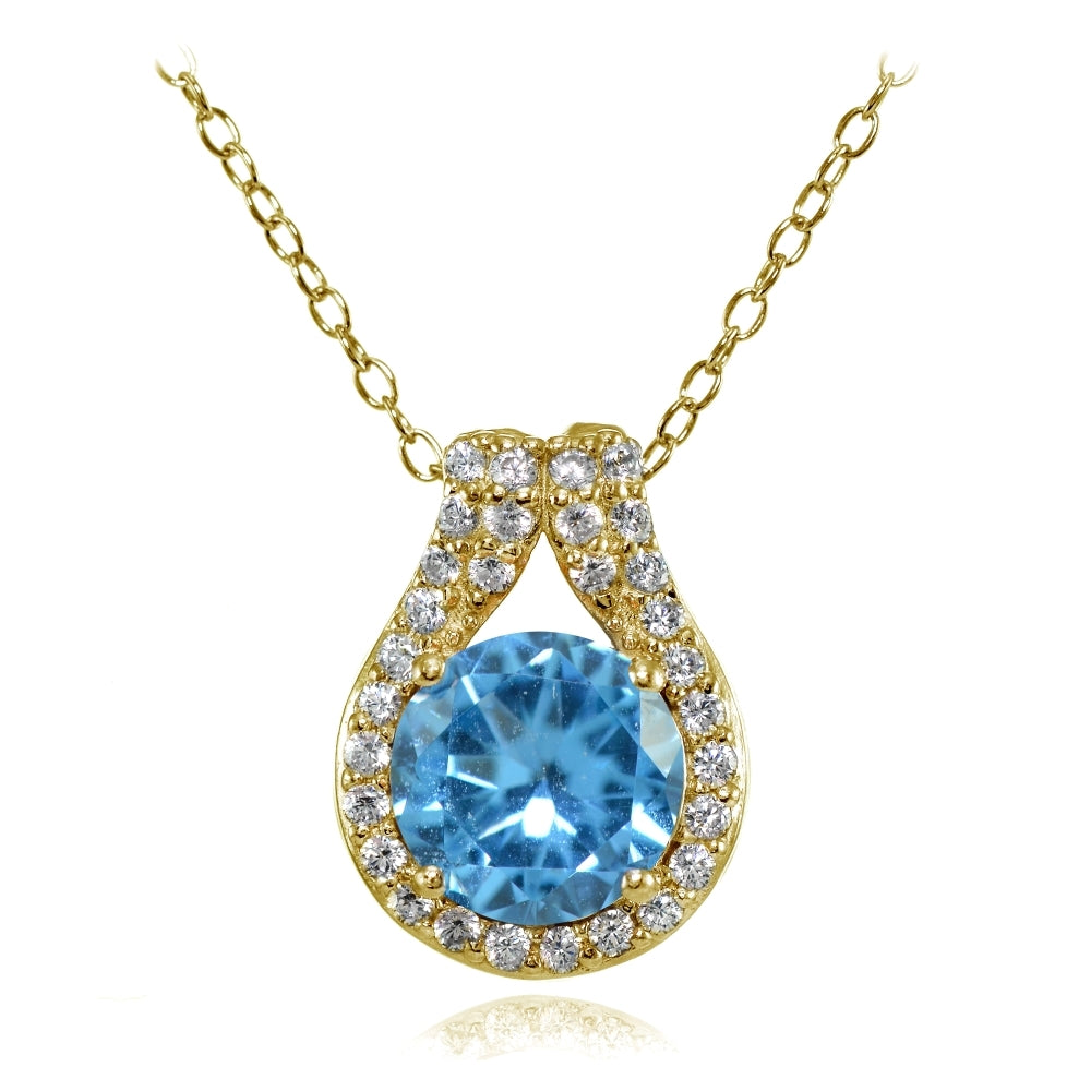 Yellow Gold Flashed Sterling Silver Created Blue Topaz Round Halo Necklace with CZ Accents