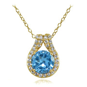 Yellow Gold Flashed Sterling Silver Created Blue Topaz Round Halo Necklace with CZ Accents