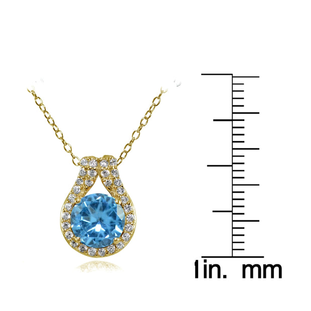 Yellow Gold Flashed Sterling Silver Created Blue Topaz Round Halo Necklace with CZ Accents