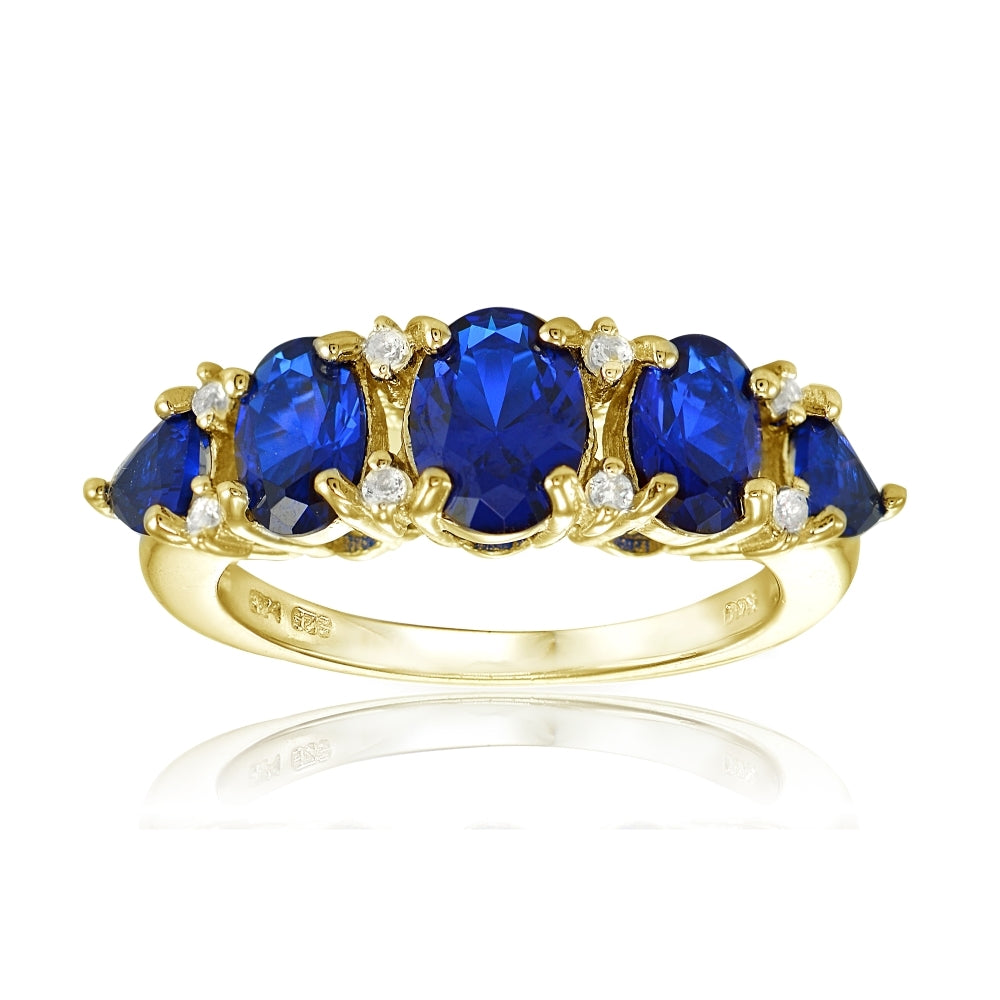 Yellow Gold Flashed Sterling Silver Created Blue Sapphire and White Topaz -Stone Half Eternity Band Ring