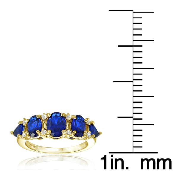 Yellow Gold Flashed Sterling Silver Created Blue Sapphire and White Topaz -Stone Half Eternity Band Ring