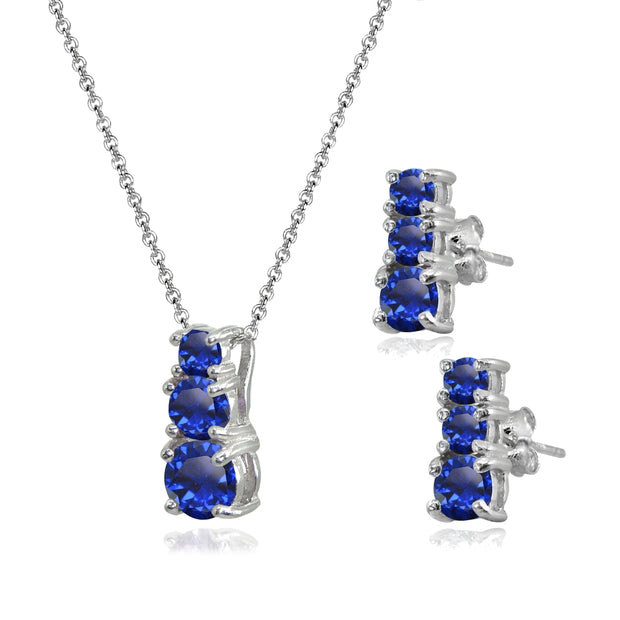 Sterling Silver Created Blue Sapphire Round Graduating Three Stone Stud Earrings & Necklace Set